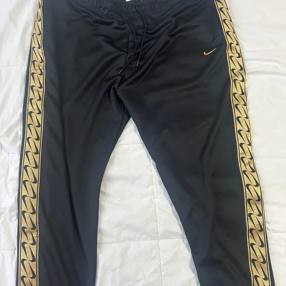 Nike Black Women's Track Pants with Gold Detail - Picture 1 of 4